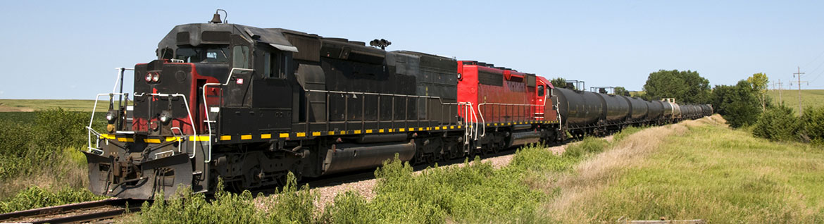black train on a railroad